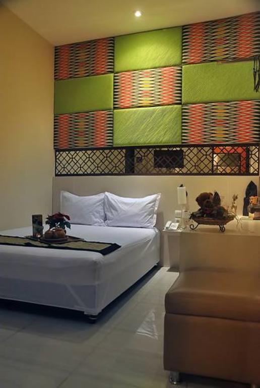 Metro House Hotell Surabaya Rom bilde